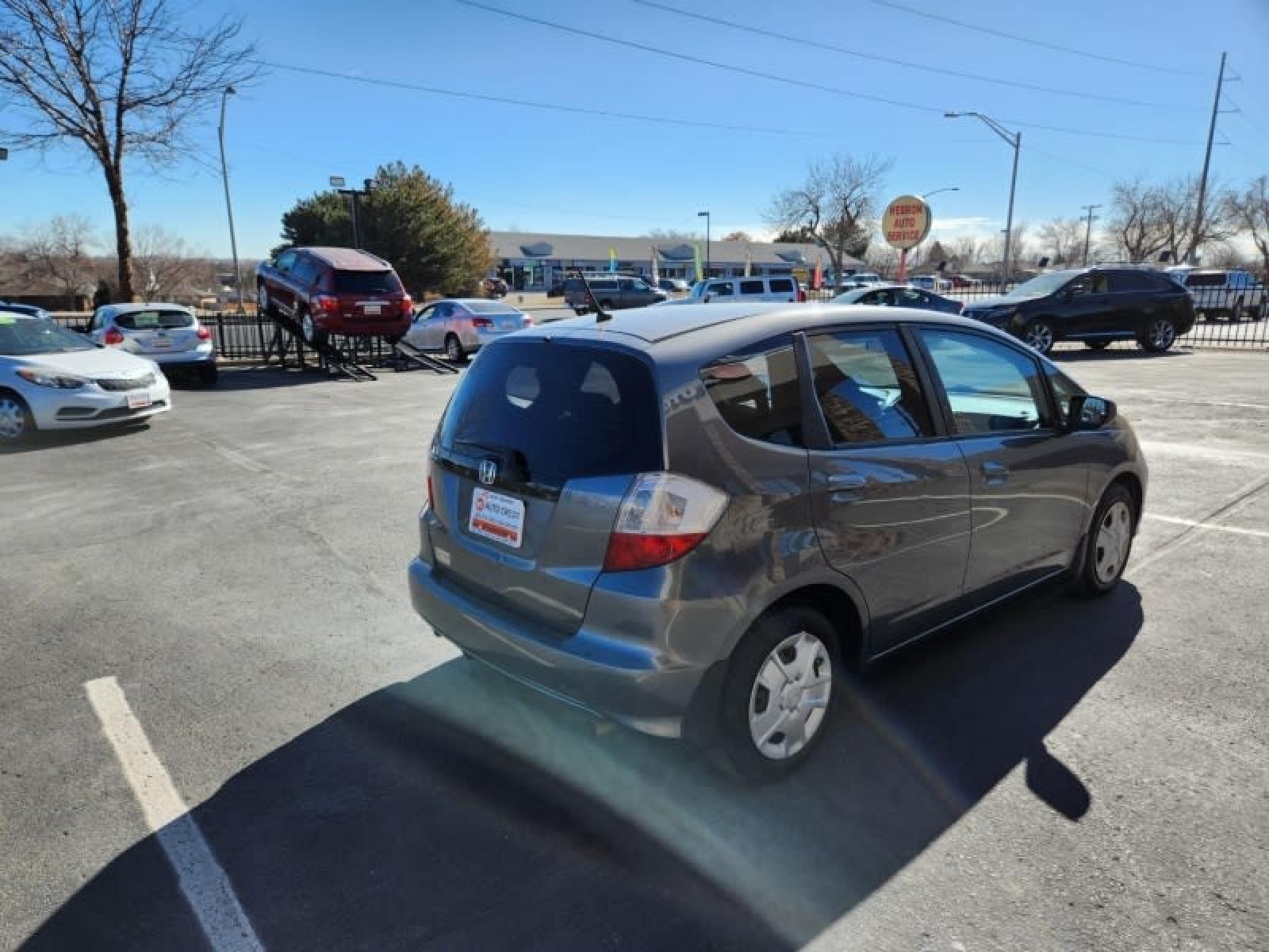 2013 HONDA FIT 5-SPEED AT (JHMGE8H37DC) with an 1.5L L4 SOHC 16V engine, 5-Speed Automatic transmission, located at 8595 Washington St., Thornton, CO, 80229, (303) 287-5511, 39.852348, -104.978447 - Looking for a reliable and affordable pre-owned vehicle in Thornton, CO? Look no further than D1 Auto Credit - Thornton. We are a trusted used car dealer serving customers in Denver County, Jefferson County, and Adams County, Colorado. Whether you're in the market for a car, truck, van, SUV, or cros - Photo #5