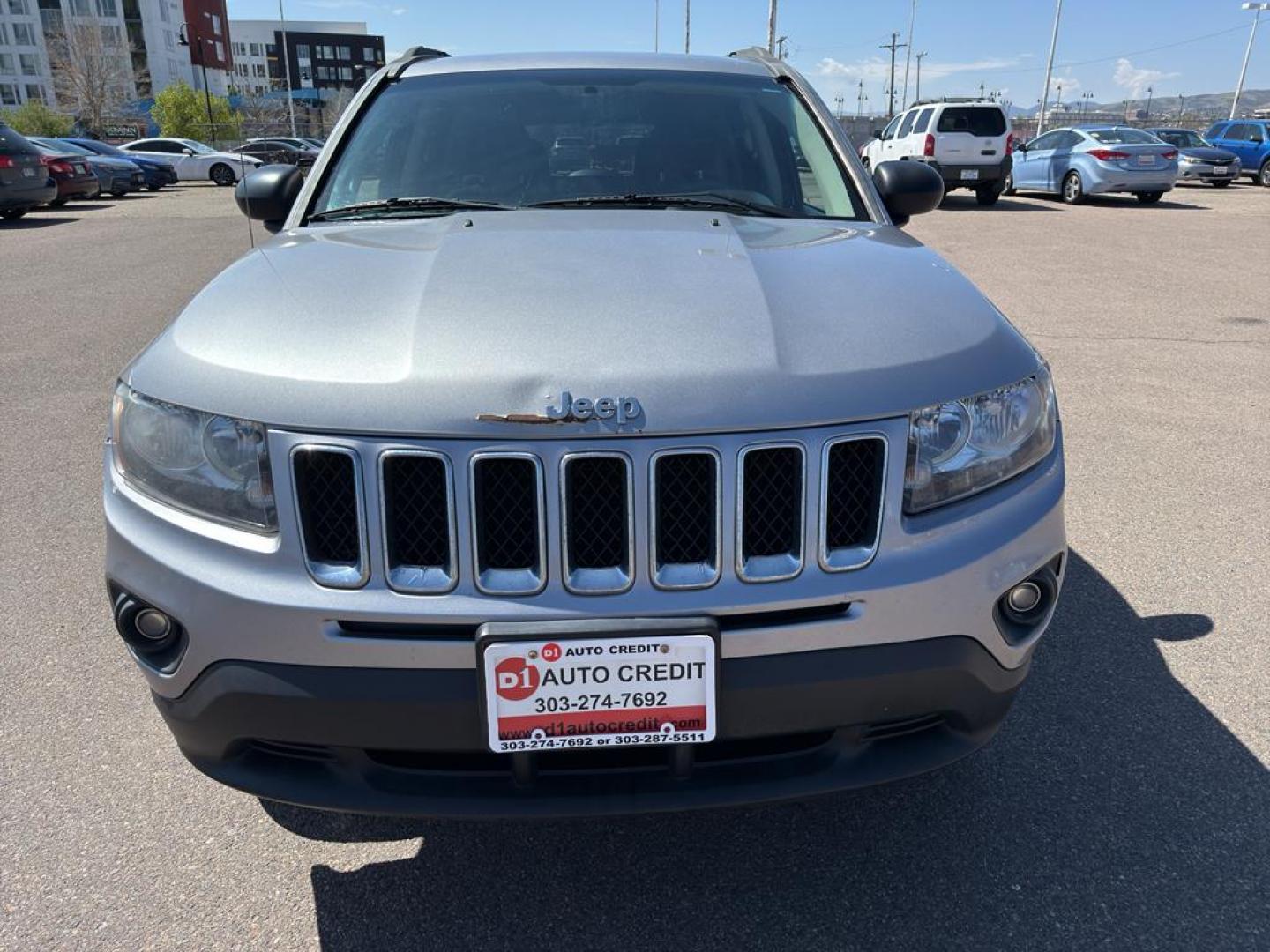 2015 SILVER Jeep Compass Sport (1C4NJDBB9FD) with an 4 Cyl, 2.4L engine, Automatic transmission, located at 10890 W. Colfax Ave., Lakewood, CO, 80215, (303) 274-7692, 39.739914, -105.120132 - Photo#1