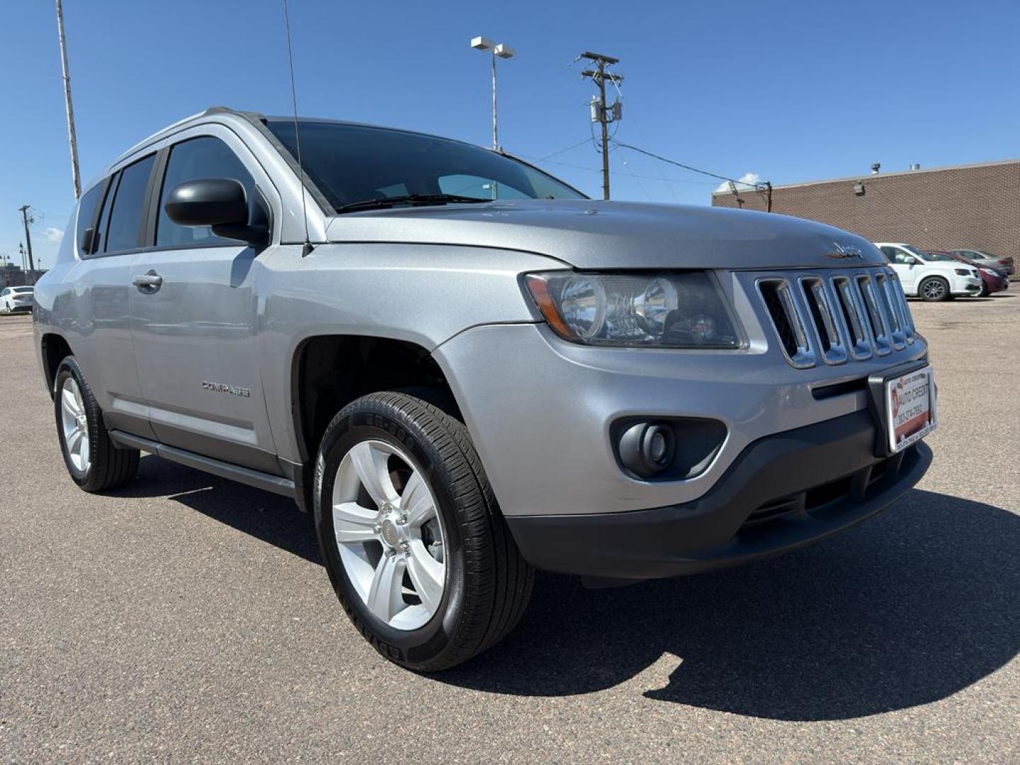 2015 SILVER Jeep Compass Sport (1C4NJDBB9FD) with an 4 Cyl, 2.4L engine, Automatic transmission, located at 10890 W. Colfax Ave., Lakewood, CO, 80215, (303) 274-7692, 39.739914, -105.120132 - Photo#2