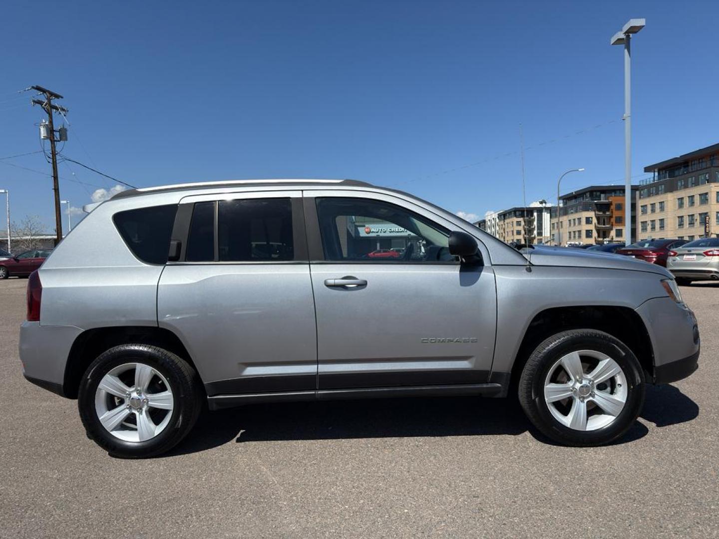 2015 SILVER Jeep Compass Sport (1C4NJDBB9FD) with an 4 Cyl, 2.4L engine, Automatic transmission, located at 10890 W. Colfax Ave., Lakewood, CO, 80215, (303) 274-7692, 39.739914, -105.120132 - Photo#3
