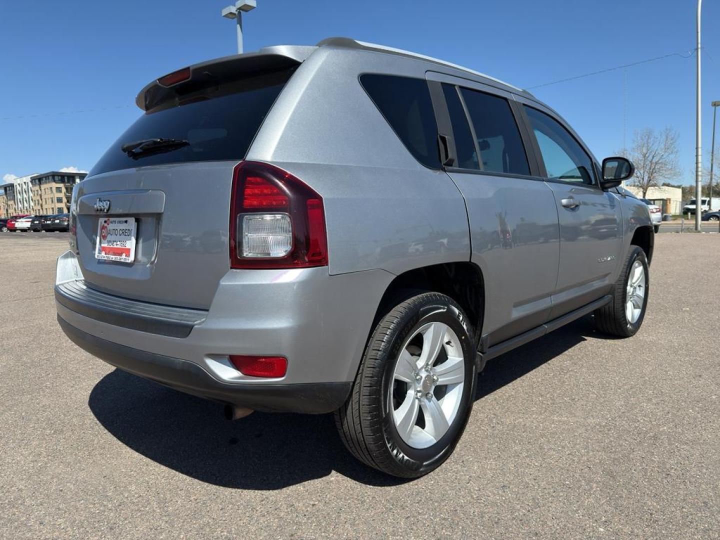 2015 SILVER Jeep Compass Sport (1C4NJDBB9FD) with an 4 Cyl, 2.4L engine, Automatic transmission, located at 10890 W. Colfax Ave., Lakewood, CO, 80215, (303) 274-7692, 39.739914, -105.120132 - Photo#4