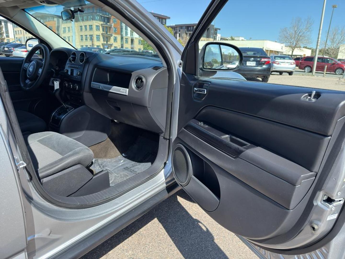 2015 SILVER Jeep Compass Sport (1C4NJDBB9FD) with an 4 Cyl, 2.4L engine, Automatic transmission, located at 10890 W. Colfax Ave., Lakewood, CO, 80215, (303) 274-7692, 39.739914, -105.120132 - Photo#8