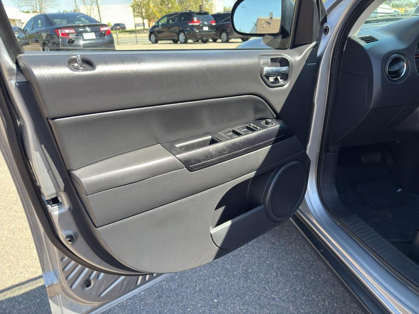2015 SILVER Jeep Compass Sport (1C4NJDBB9FD) with an 4 Cyl, 2.4L engine, Automatic transmission, located at 10890 W. Colfax Ave., Lakewood, CO, 80215, (303) 274-7692, 39.739914, -105.120132 - Photo#12