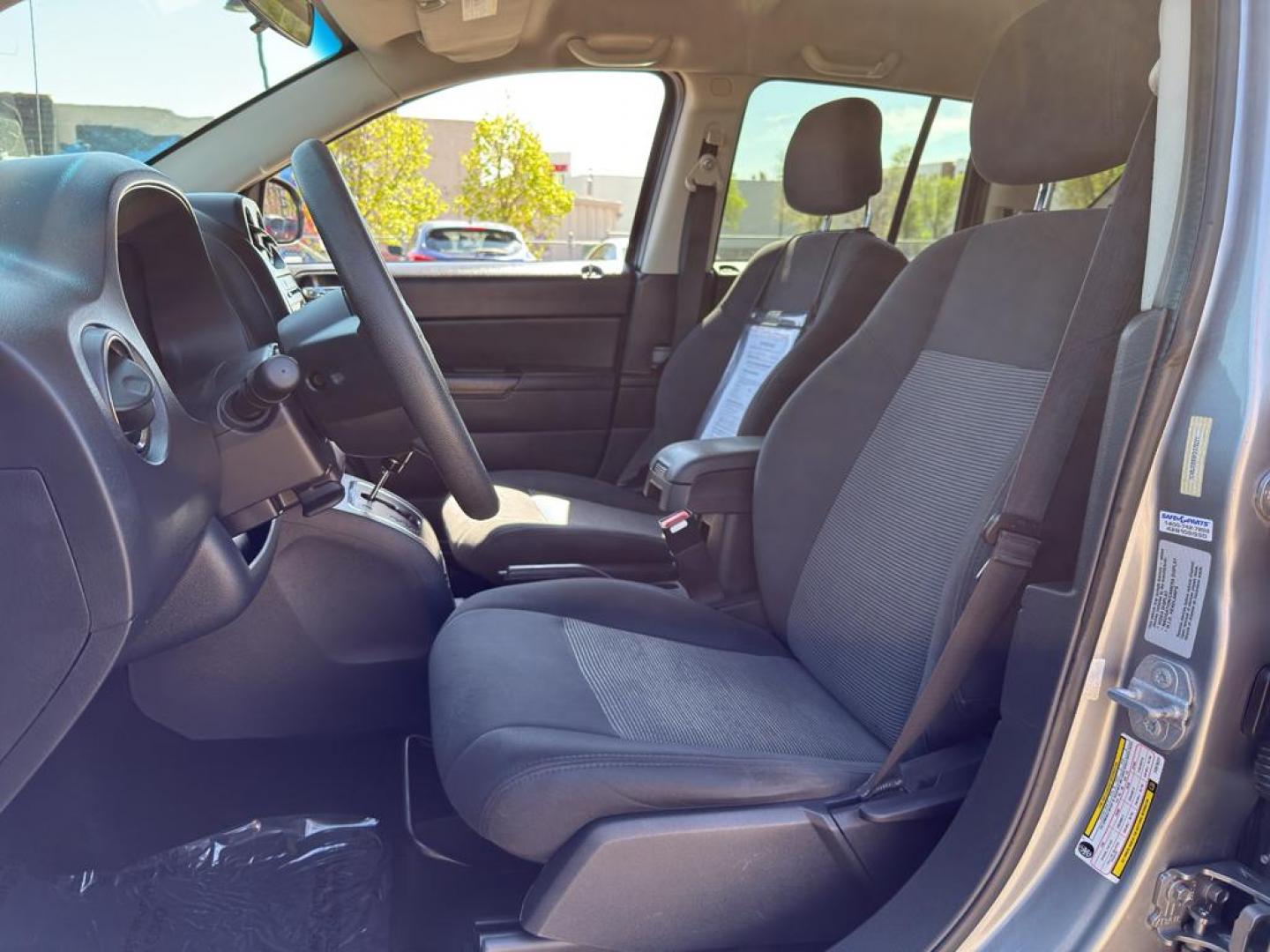 2015 SILVER Jeep Compass Sport (1C4NJDBB9FD) with an 4 Cyl, 2.4L engine, Automatic transmission, located at 10890 W. Colfax Ave., Lakewood, CO, 80215, (303) 274-7692, 39.739914, -105.120132 - Photo#13