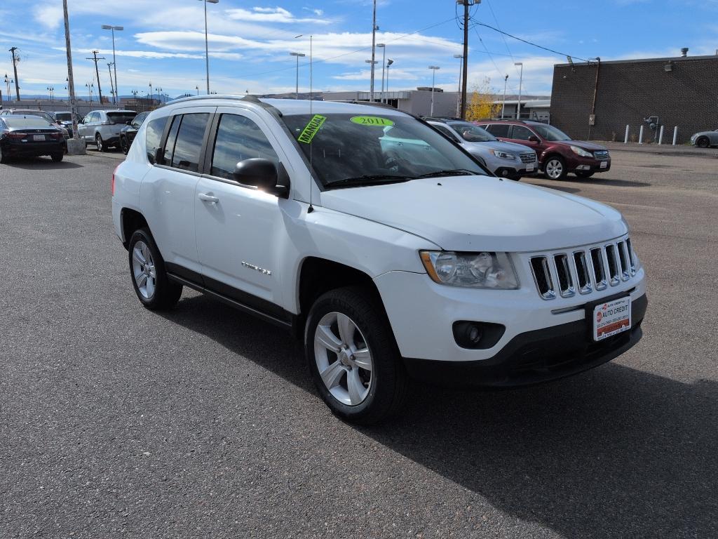 2011 WHITE Jeep Compass Sport (1J4NT1FA7BD) with an 4 Cyl, 2.0L engine, Manual transmission, located at 10890 W. Colfax Ave., Lakewood, CO, 80215, (303) 274-7692, 39.739914, -105.120132 - Photo#2