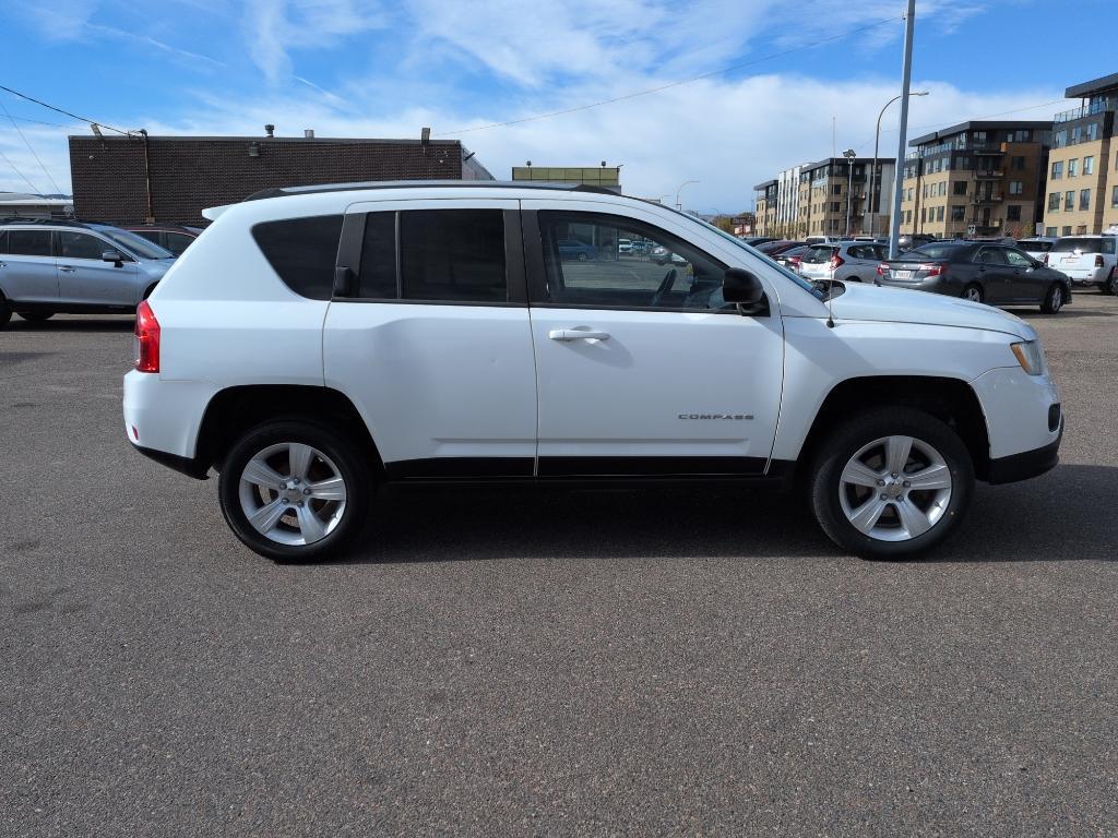 2011 WHITE Jeep Compass Sport (1J4NT1FA7BD) with an 4 Cyl, 2.0L engine, Manual transmission, located at 10890 W. Colfax Ave., Lakewood, CO, 80215, (303) 274-7692, 39.739914, -105.120132 - Photo#3