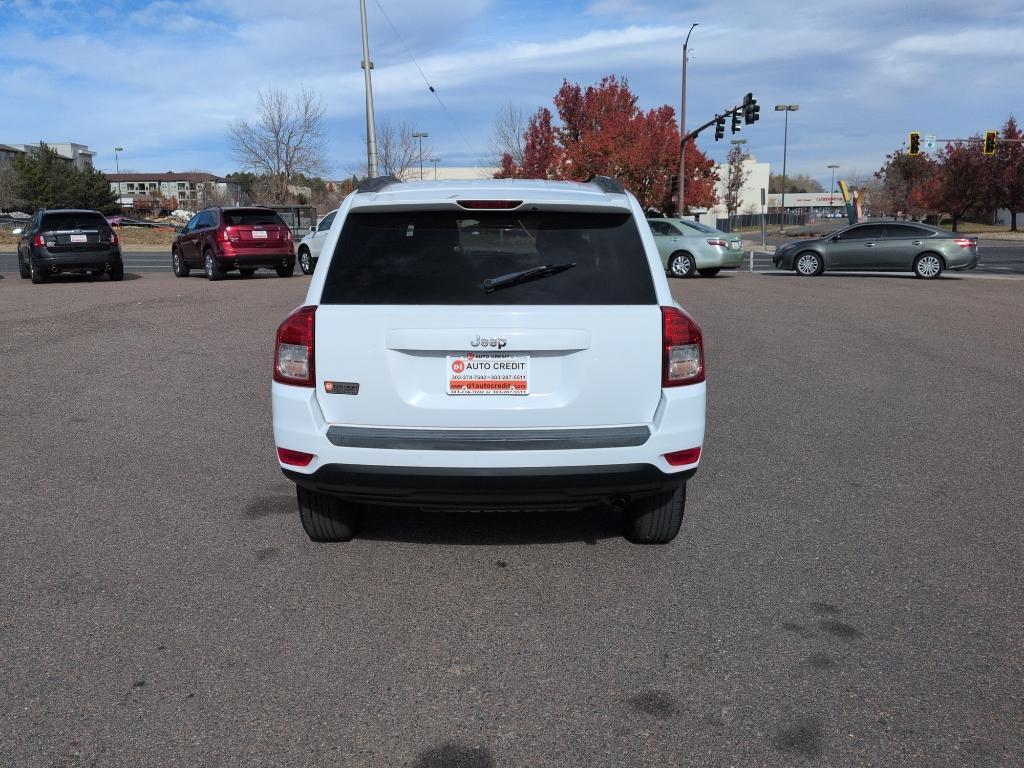 2011 WHITE Jeep Compass Sport (1J4NT1FA7BD) with an 4 Cyl, 2.0L engine, Manual transmission, located at 10890 W. Colfax Ave., Lakewood, CO, 80215, (303) 274-7692, 39.739914, -105.120132 - Photo#5