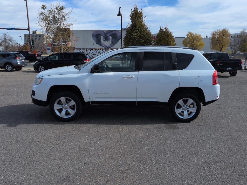 2011 WHITE Jeep Compass Sport (1J4NT1FA7BD) with an 4 Cyl, 2.0L engine, Manual transmission, located at 10890 W. Colfax Ave., Lakewood, CO, 80215, (303) 274-7692, 39.739914, -105.120132 - Photo#7
