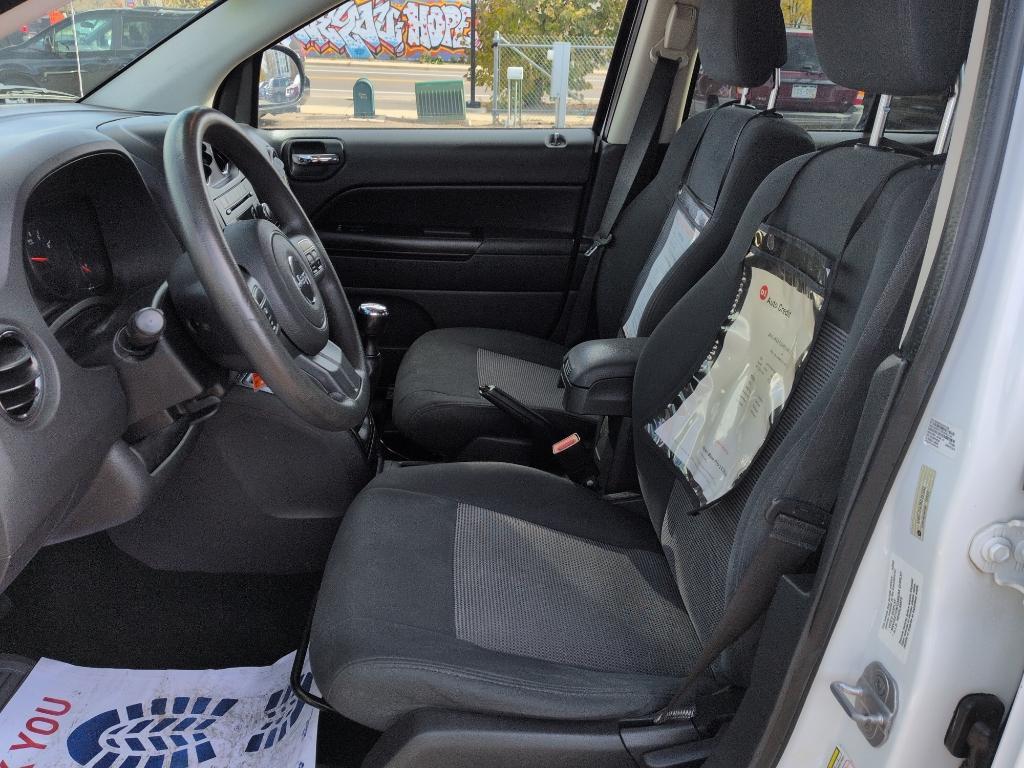 2011 WHITE Jeep Compass Sport (1J4NT1FA7BD) with an 4 Cyl, 2.0L engine, Manual transmission, located at 10890 W. Colfax Ave., Lakewood, CO, 80215, (303) 274-7692, 39.739914, -105.120132 - Photo#9