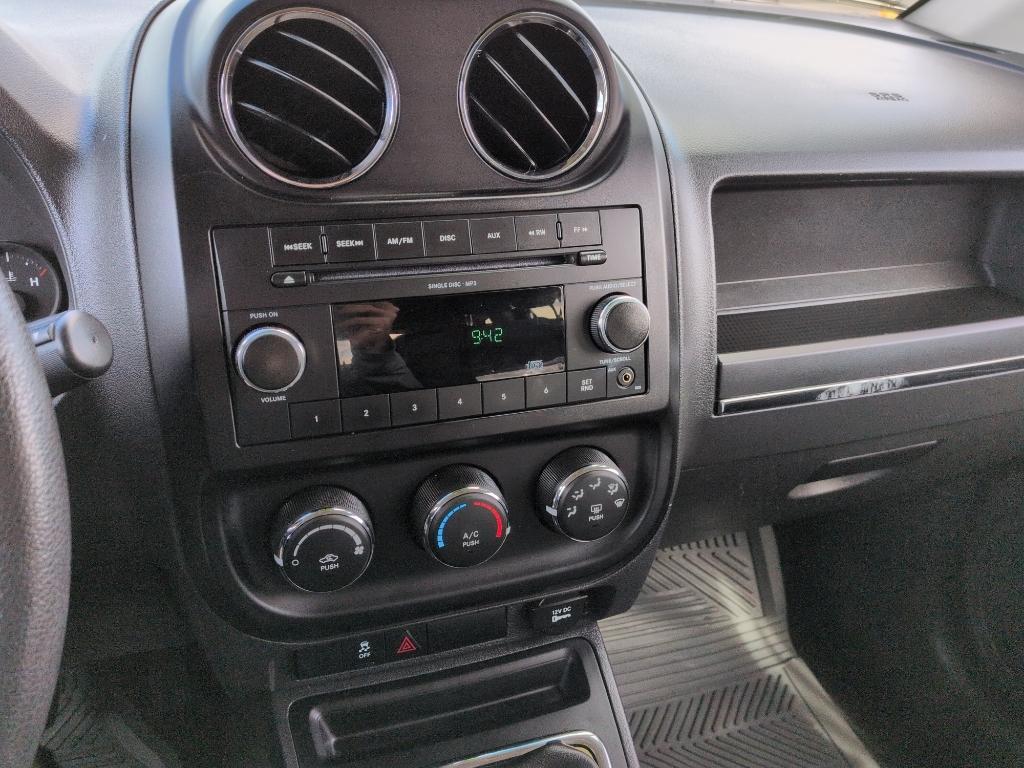 2011 WHITE Jeep Compass Sport (1J4NT1FA7BD) with an 4 Cyl, 2.0L engine, Manual transmission, located at 10890 W. Colfax Ave., Lakewood, CO, 80215, (303) 274-7692, 39.739914, -105.120132 - Photo#12