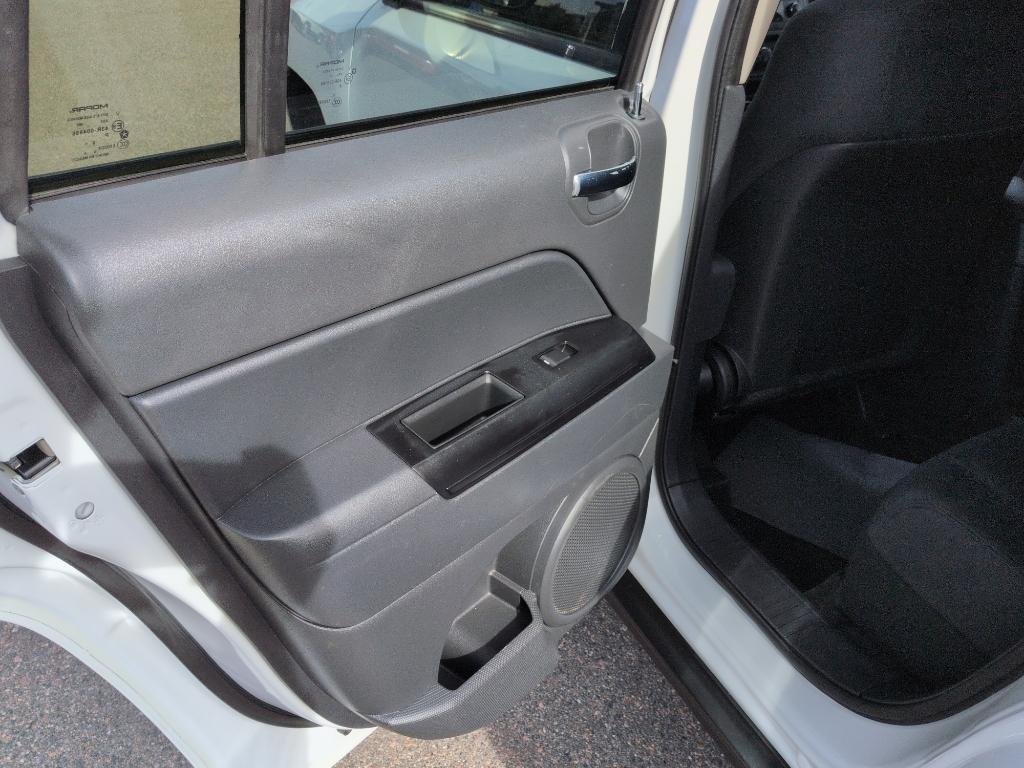 2011 WHITE Jeep Compass Sport (1J4NT1FA7BD) with an 4 Cyl, 2.0L engine, Manual transmission, located at 10890 W. Colfax Ave., Lakewood, CO, 80215, (303) 274-7692, 39.739914, -105.120132 - Photo#14