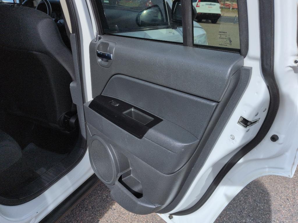 2011 WHITE Jeep Compass Sport (1J4NT1FA7BD) with an 4 Cyl, 2.0L engine, Manual transmission, located at 10890 W. Colfax Ave., Lakewood, CO, 80215, (303) 274-7692, 39.739914, -105.120132 - Photo#18