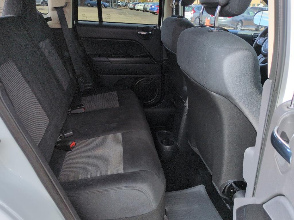 2011 WHITE Jeep Compass Sport (1J4NT1FA7BD) with an 4 Cyl, 2.0L engine, Manual transmission, located at 10890 W. Colfax Ave., Lakewood, CO, 80215, (303) 274-7692, 39.739914, -105.120132 - Photo#19