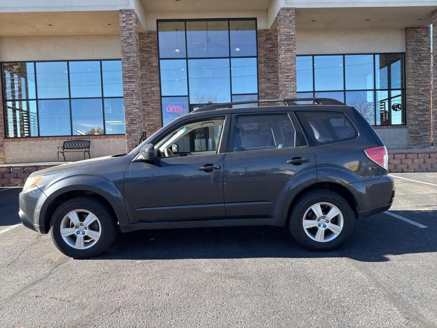 2012 Dark Gray Metallic /Platinum Subaru Forester 2.5X (JF2SHBBC1CH) with an 2.5L 4-Cylinder DOHC 16V VVT engine, Automatic transmission, located at 10890 W. Colfax Ave., Lakewood, CO, 80215, (303) 274-7692, 39.739914, -105.120132 - 2012 Subaru Forester AWD All Cars Have Clean Titles And Are Serviced Before Sale., Non Smoker, No Pet Odor Or Hair, Forester 2.5X, AWD.<br><br>D1 Auto NEVER charges dealer fees! All cars have clean titles and have been inspected for mechanical issues. We have financing for everyone. Good credit, bad - Photo#4