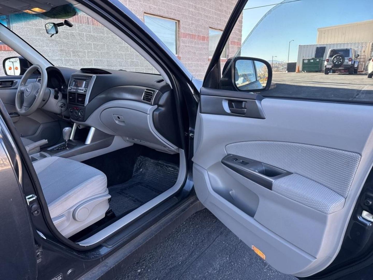 2012 Dark Gray Metallic /Platinum Subaru Forester 2.5X (JF2SHBBC1CH) with an 2.5L 4-Cylinder DOHC 16V VVT engine, Automatic transmission, located at 10890 W. Colfax Ave., Lakewood, CO, 80215, (303) 274-7692, 39.739914, -105.120132 - 2012 Subaru Forester AWD All Cars Have Clean Titles And Are Serviced Before Sale., Non Smoker, No Pet Odor Or Hair, Forester 2.5X, AWD.<br><br>D1 Auto NEVER charges dealer fees! All cars have clean titles and have been inspected for mechanical issues. We have financing for everyone. Good credit, bad - Photo#18