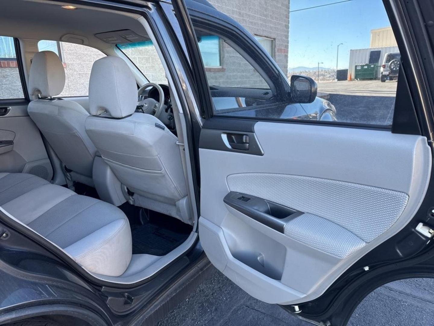 2012 Dark Gray Metallic /Platinum Subaru Forester 2.5X (JF2SHBBC1CH) with an 2.5L 4-Cylinder DOHC 16V VVT engine, Automatic transmission, located at 10890 W. Colfax Ave., Lakewood, CO, 80215, (303) 274-7692, 39.739914, -105.120132 - 2012 Subaru Forester AWD All Cars Have Clean Titles And Are Serviced Before Sale., Non Smoker, No Pet Odor Or Hair, Forester 2.5X, AWD.<br><br>D1 Auto NEVER charges dealer fees! All cars have clean titles and have been inspected for mechanical issues. We have financing for everyone. Good credit, bad - Photo#19
