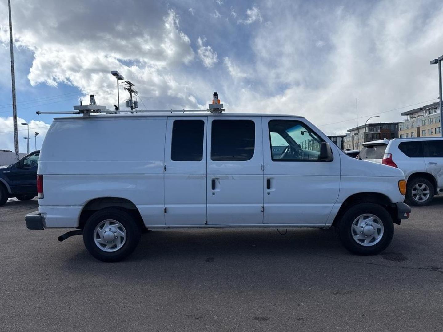 2007 WHITE Ford Econoline Base (1FTNE24L67D) with an V8, 5.4L (330 CID) engine, Automatic transmission, located at 10890 W. Colfax Ave., Lakewood, CO, 80215, (303) 274-7692, 39.739914, -105.120132 - For sale: a reliable and robust 2007 Ford Econoline E250 Base, perfect for both personal and professional use. This sturdy vehicle features a powerful V8, 5.4L (330 CID) engine, ensuring you have the strength to tackle any task. With rear-wheel drive, it provides excellent handling and stability, ma - Photo#18