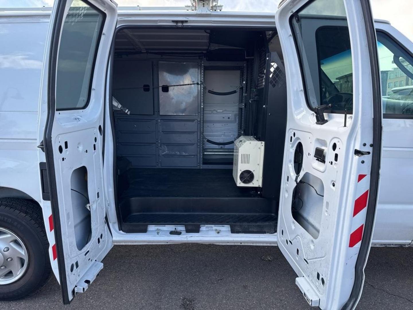 2007 WHITE Ford Econoline Base (1FTNE24L67D) with an V8, 5.4L (330 CID) engine, Automatic transmission, located at 10890 W. Colfax Ave., Lakewood, CO, 80215, (303) 274-7692, 39.739914, -105.120132 - For sale: a reliable and robust 2007 Ford Econoline E250 Base, perfect for both personal and professional use. This sturdy vehicle features a powerful V8, 5.4L (330 CID) engine, ensuring you have the strength to tackle any task. With rear-wheel drive, it provides excellent handling and stability, ma - Photo#28