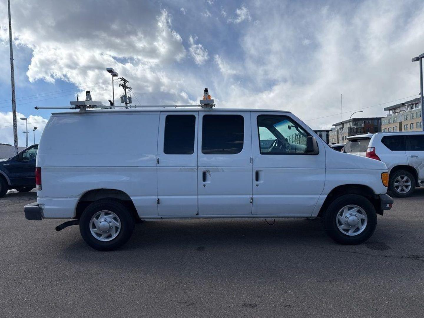 2007 WHITE Ford Econoline Base (1FTNE24L67D) with an V8, 5.4L (330 CID) engine, Automatic transmission, located at 10890 W. Colfax Ave., Lakewood, CO, 80215, (303) 274-7692, 39.739914, -105.120132 - For sale: a reliable and robust 2007 Ford Econoline E250 Base, perfect for both personal and professional use. This sturdy vehicle features a powerful V8, 5.4L (330 CID) engine, ensuring you have the strength to tackle any task. With rear-wheel drive, it provides excellent handling and stability, ma - Photo#1