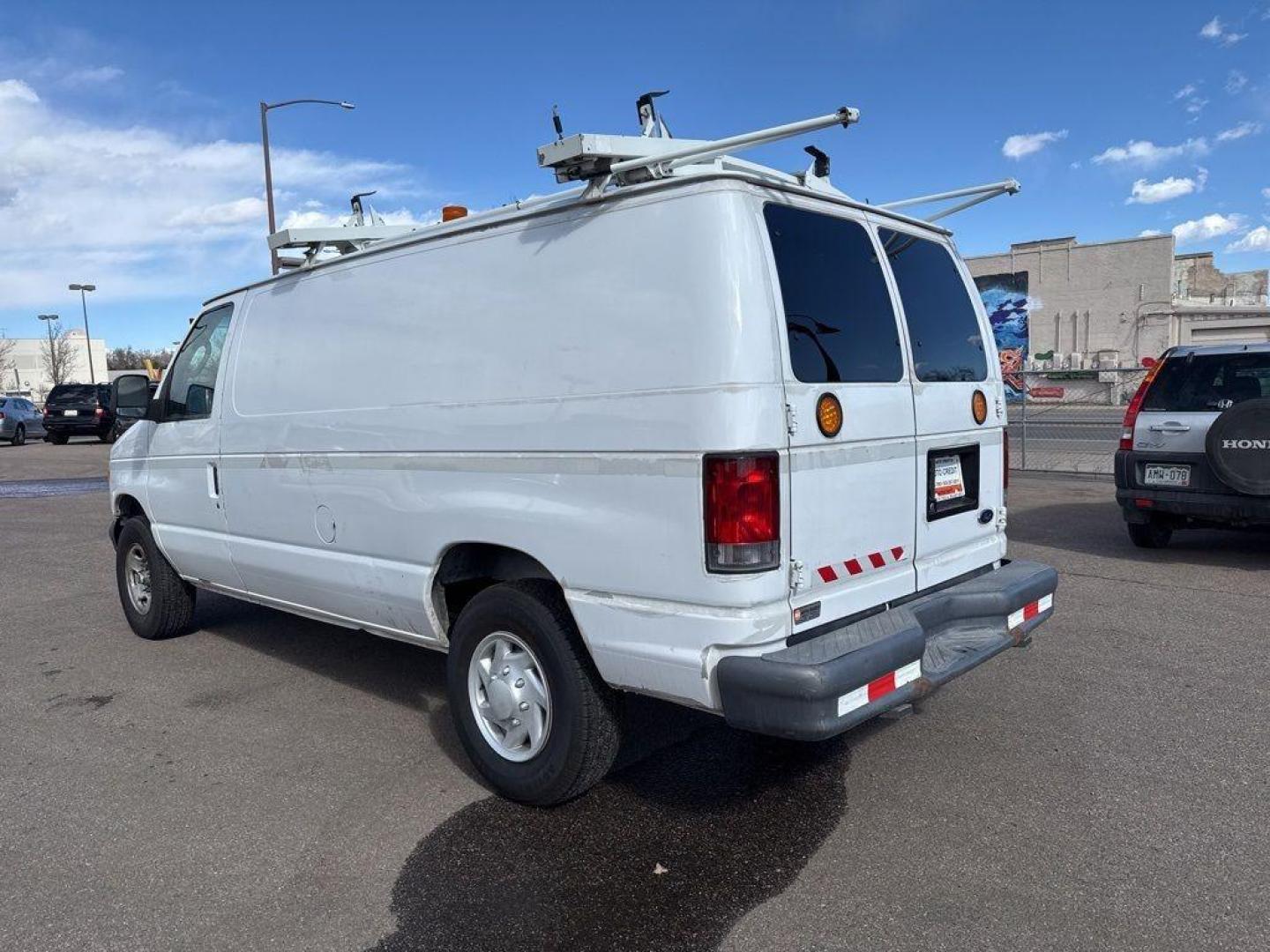 2007 WHITE Ford Econoline Base (1FTNE24L67D) with an V8, 5.4L (330 CID) engine, Automatic transmission, located at 10890 W. Colfax Ave., Lakewood, CO, 80215, (303) 274-7692, 39.739914, -105.120132 - For sale: a reliable and robust 2007 Ford Econoline E250 Base, perfect for both personal and professional use. This sturdy vehicle features a powerful V8, 5.4L (330 CID) engine, ensuring you have the strength to tackle any task. With rear-wheel drive, it provides excellent handling and stability, ma - Photo#4