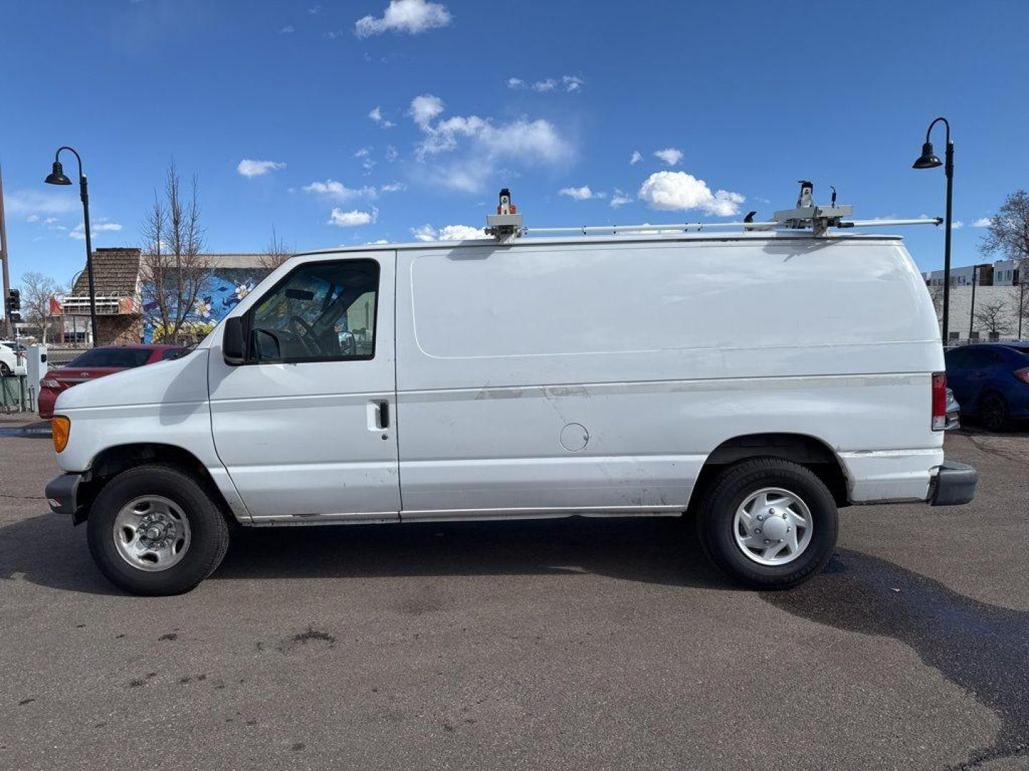 2007 WHITE Ford Econoline Base (1FTNE24L67D) with an V8, 5.4L (330 CID) engine, Automatic transmission, located at 10890 W. Colfax Ave., Lakewood, CO, 80215, (303) 274-7692, 39.739914, -105.120132 - For sale: a reliable and robust 2007 Ford Econoline E250 Base, perfect for both personal and professional use. This sturdy vehicle features a powerful V8, 5.4L (330 CID) engine, ensuring you have the strength to tackle any task. With rear-wheel drive, it provides excellent handling and stability, ma - Photo#5