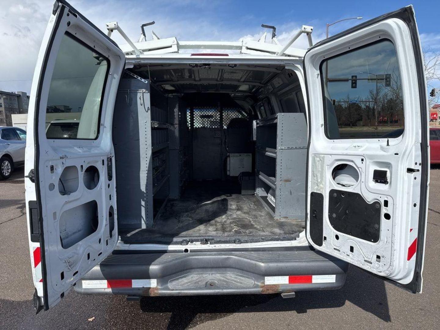 2007 WHITE Ford Econoline Base (1FTNE24L67D) with an V8, 5.4L (330 CID) engine, Automatic transmission, located at 10890 W. Colfax Ave., Lakewood, CO, 80215, (303) 274-7692, 39.739914, -105.120132 - For sale: a reliable and robust 2007 Ford Econoline E250 Base, perfect for both personal and professional use. This sturdy vehicle features a powerful V8, 5.4L (330 CID) engine, ensuring you have the strength to tackle any task. With rear-wheel drive, it provides excellent handling and stability, ma - Photo#8