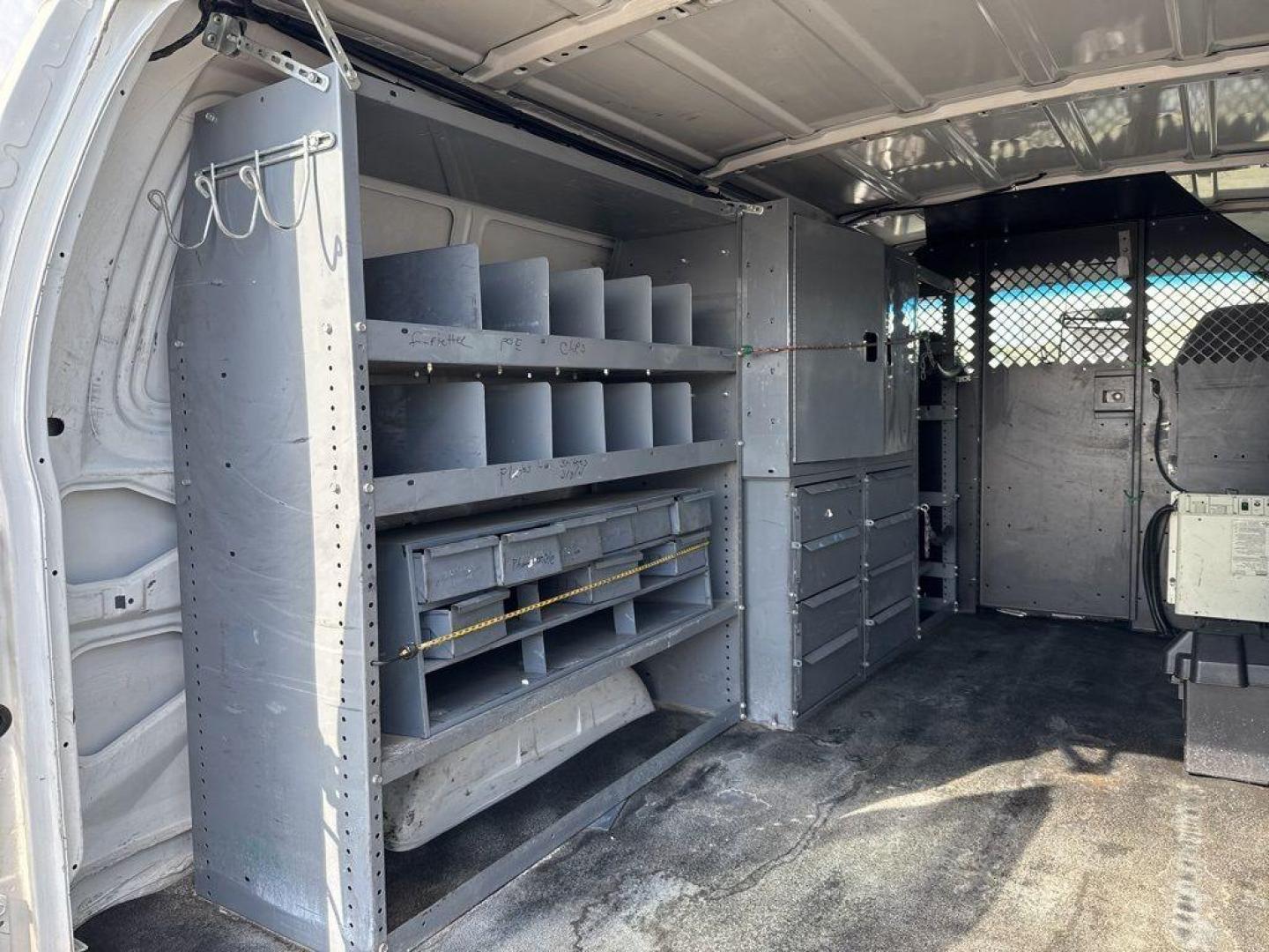 2007 WHITE Ford Econoline Base (1FTNE24L67D) with an V8, 5.4L (330 CID) engine, Automatic transmission, located at 10890 W. Colfax Ave., Lakewood, CO, 80215, (303) 274-7692, 39.739914, -105.120132 - For sale: a reliable and robust 2007 Ford Econoline E250 Base, perfect for both personal and professional use. This sturdy vehicle features a powerful V8, 5.4L (330 CID) engine, ensuring you have the strength to tackle any task. With rear-wheel drive, it provides excellent handling and stability, ma - Photo#9