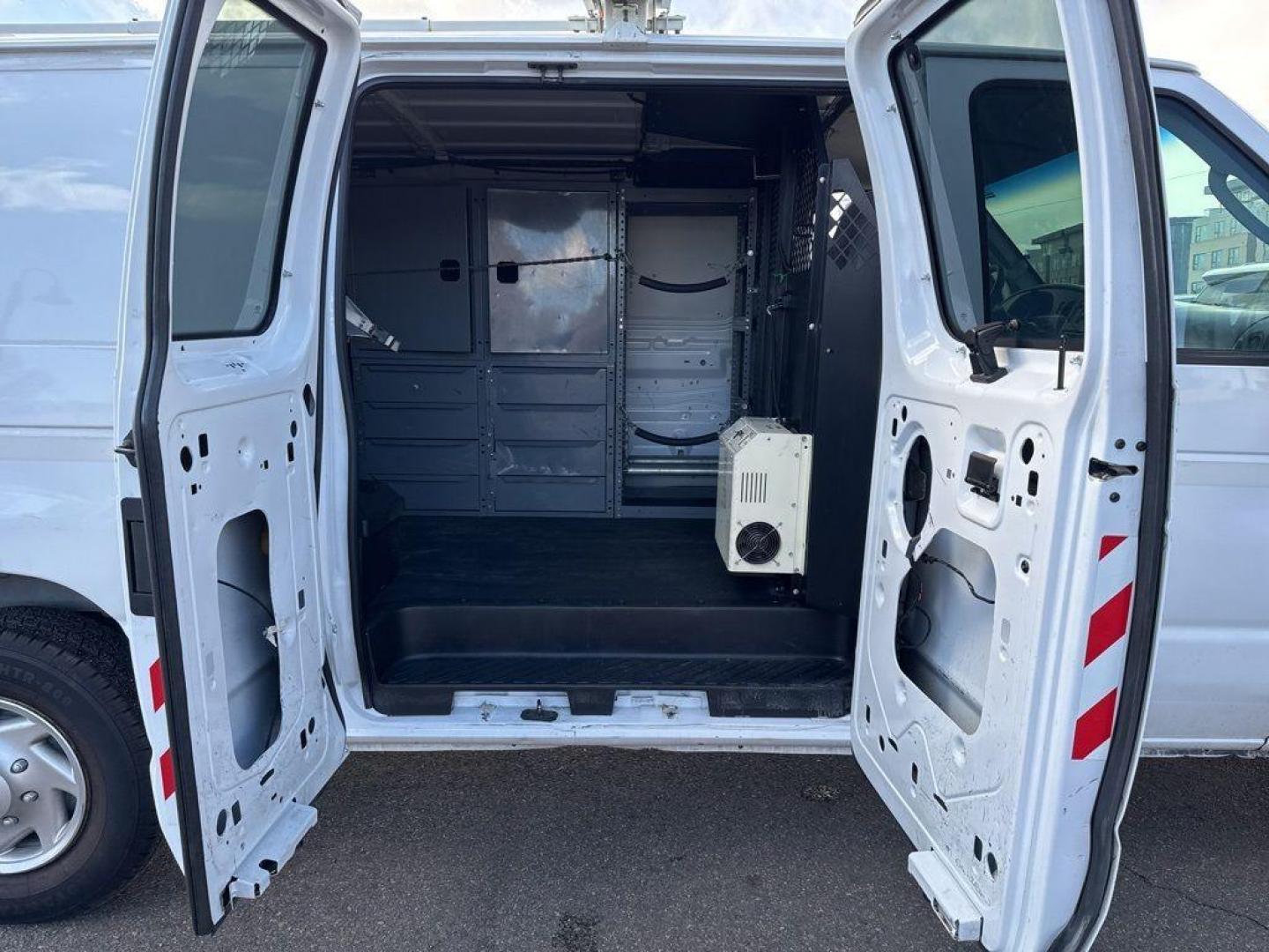 2007 WHITE Ford Econoline Base (1FTNE24L67D) with an V8, 5.4L (330 CID) engine, Automatic transmission, located at 10890 W. Colfax Ave., Lakewood, CO, 80215, (303) 274-7692, 39.739914, -105.120132 - For sale: a reliable and robust 2007 Ford Econoline E250 Base, perfect for both personal and professional use. This sturdy vehicle features a powerful V8, 5.4L (330 CID) engine, ensuring you have the strength to tackle any task. With rear-wheel drive, it provides excellent handling and stability, ma - Photo#11