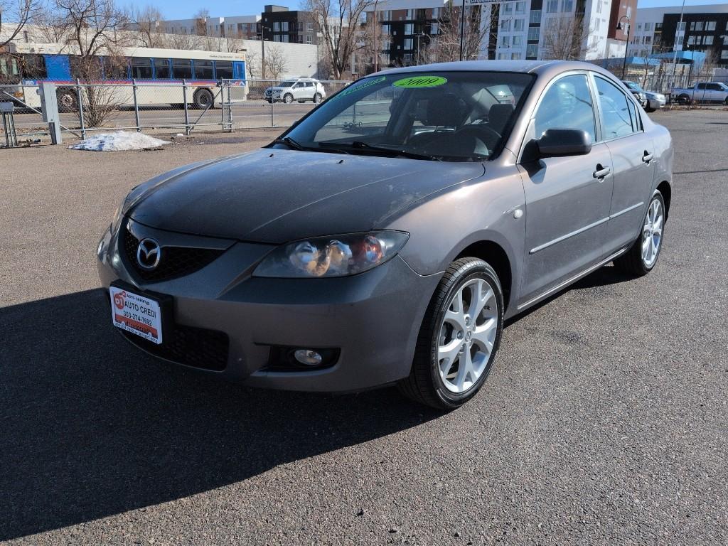 2009 GRAY Mazda Mazda3 i (JM1BK32FX91) with an 4 Cyl, 2.0L engine, Automatic transmission, located at 10890 W. Colfax Ave., Lakewood, CO, 80215, (303) 274-7692, 39.739914, -105.120132 - Photo#0