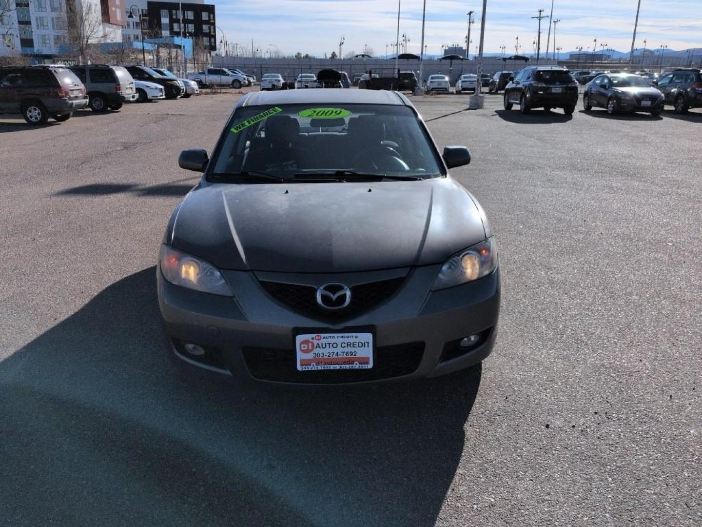 2009 GRAY Mazda Mazda3 i (JM1BK32FX91) with an 4 Cyl, 2.0L engine, Manual 5-Speed transmission, located at 10890 W. Colfax Ave., Lakewood, CO, 80215, (303) 274-7692, 39.739914, -105.120132 - Photo#1