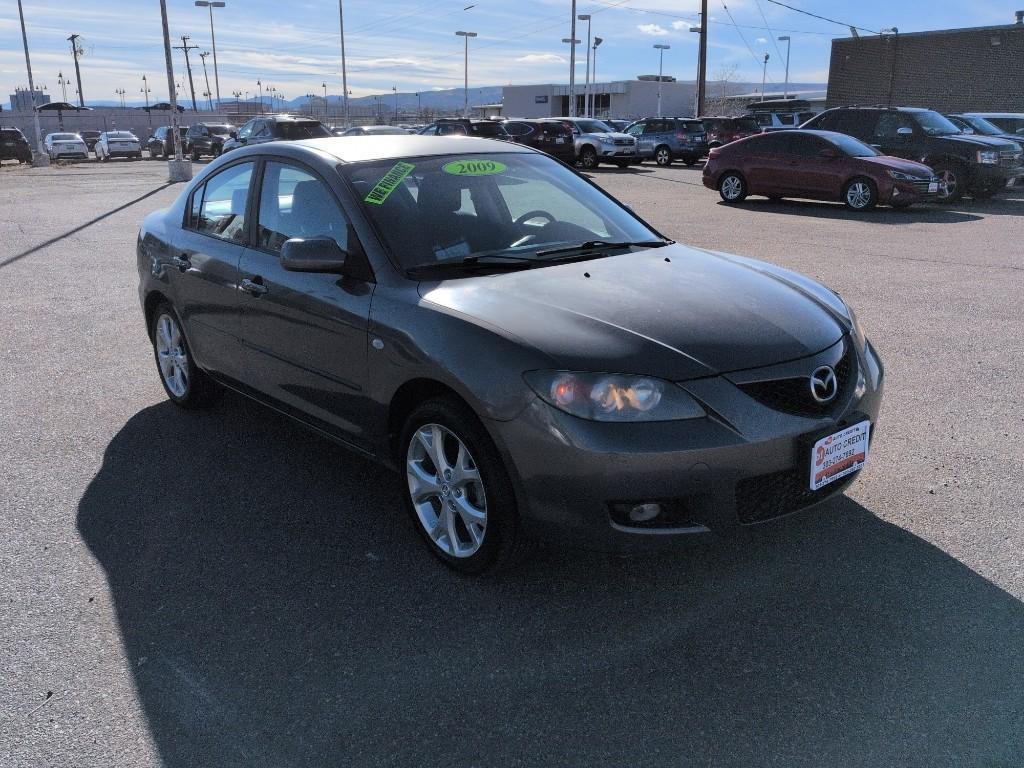 2009 GRAY Mazda Mazda3 i (JM1BK32FX91) with an 4 Cyl, 2.0L engine, Automatic transmission, located at 10890 W. Colfax Ave., Lakewood, CO, 80215, (303) 274-7692, 39.739914, -105.120132 - Photo#2