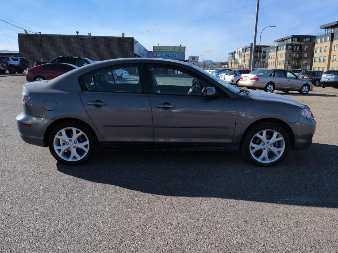 2009 GRAY Mazda Mazda3 i (JM1BK32FX91) with an 4 Cyl, 2.0L engine, Manual 5-Speed transmission, located at 10890 W. Colfax Ave., Lakewood, CO, 80215, (303) 274-7692, 39.739914, -105.120132 - Photo#3