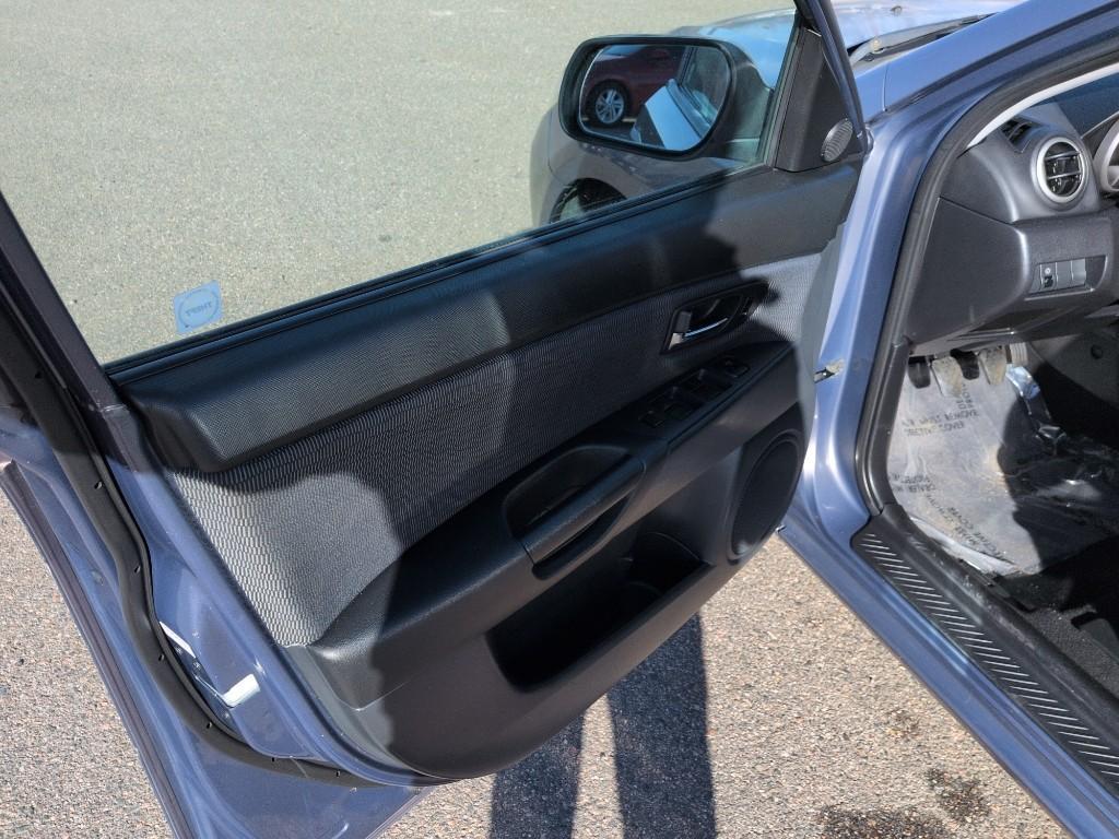 2009 GRAY Mazda Mazda3 i (JM1BK32FX91) with an 4 Cyl, 2.0L engine, Automatic transmission, located at 10890 W. Colfax Ave., Lakewood, CO, 80215, (303) 274-7692, 39.739914, -105.120132 - Photo#8