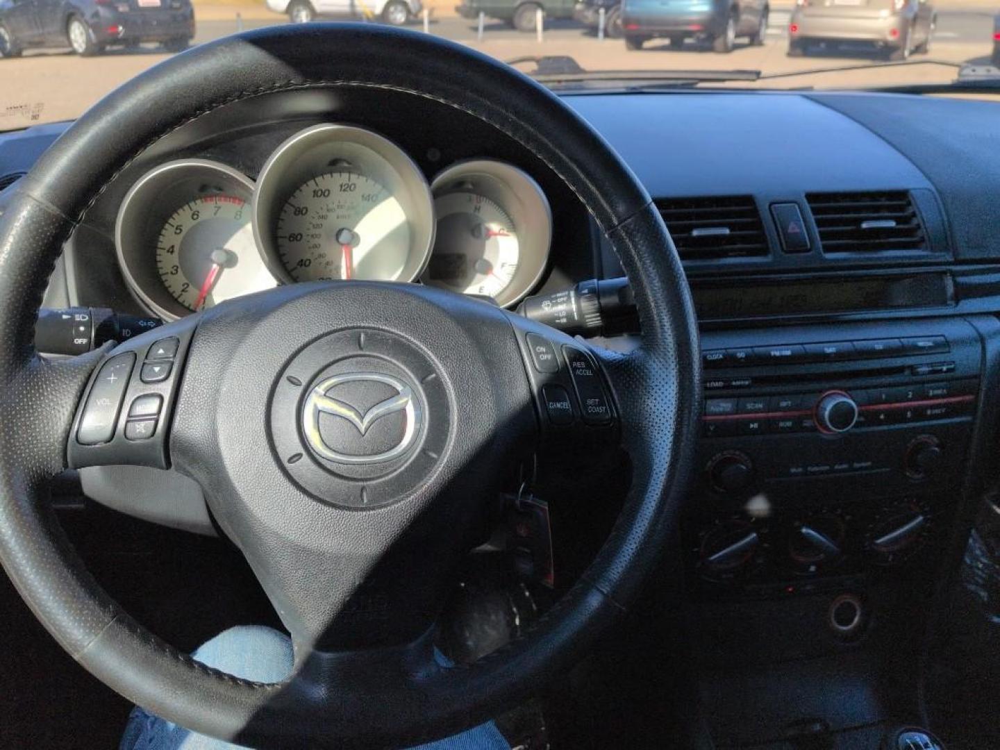 2009 GRAY Mazda Mazda3 i (JM1BK32FX91) with an 4 Cyl, 2.0L engine, Manual 5-Speed transmission, located at 10890 W. Colfax Ave., Lakewood, CO, 80215, (303) 274-7692, 39.739914, -105.120132 - Photo#10