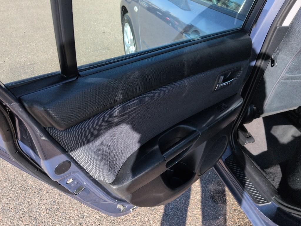 2009 GRAY Mazda Mazda3 i (JM1BK32FX91) with an 4 Cyl, 2.0L engine, Automatic transmission, located at 10890 W. Colfax Ave., Lakewood, CO, 80215, (303) 274-7692, 39.739914, -105.120132 - Photo#14