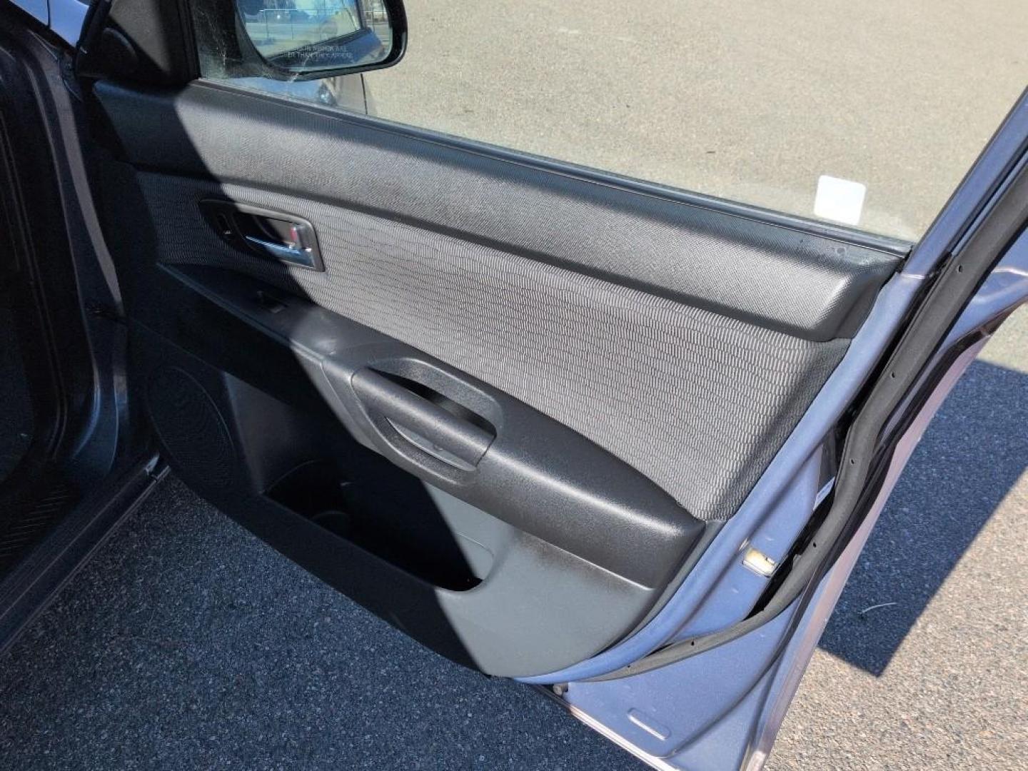 2009 GRAY Mazda Mazda3 i (JM1BK32FX91) with an 4 Cyl, 2.0L engine, Manual 5-Speed transmission, located at 10890 W. Colfax Ave., Lakewood, CO, 80215, (303) 274-7692, 39.739914, -105.120132 - Photo#16