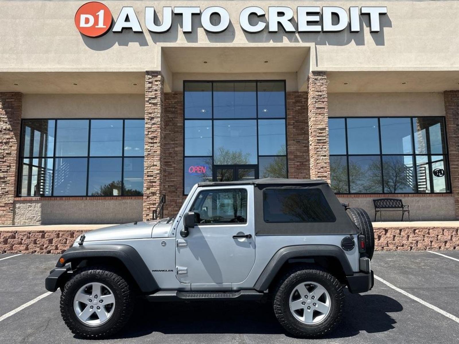 2011 Bright Silver Metallic Clearcoat /Black Interior Jeep Wrangler Sport (1J4GA2D13BL) with an 3.8L V6 SMPI engine, Automatic transmission, located at 8595 Washington St., Thornton, CO, 80229, (303) 287-5511, 39.852348, -104.978447 - 2011 Jeep Wrangler Automatic in Excellent Condition! <br><br>All Cars Have Clean Titles And Are Serviced Before Sale., Clean Carfax, No Accident, Non Smoker, No Pet Odor Or Hair, 4-Speed Automatic, 4WD.<br><br>D1 Auto NEVER charges dealer fees! All cars have clean titles and have been inspected for - Photo #0