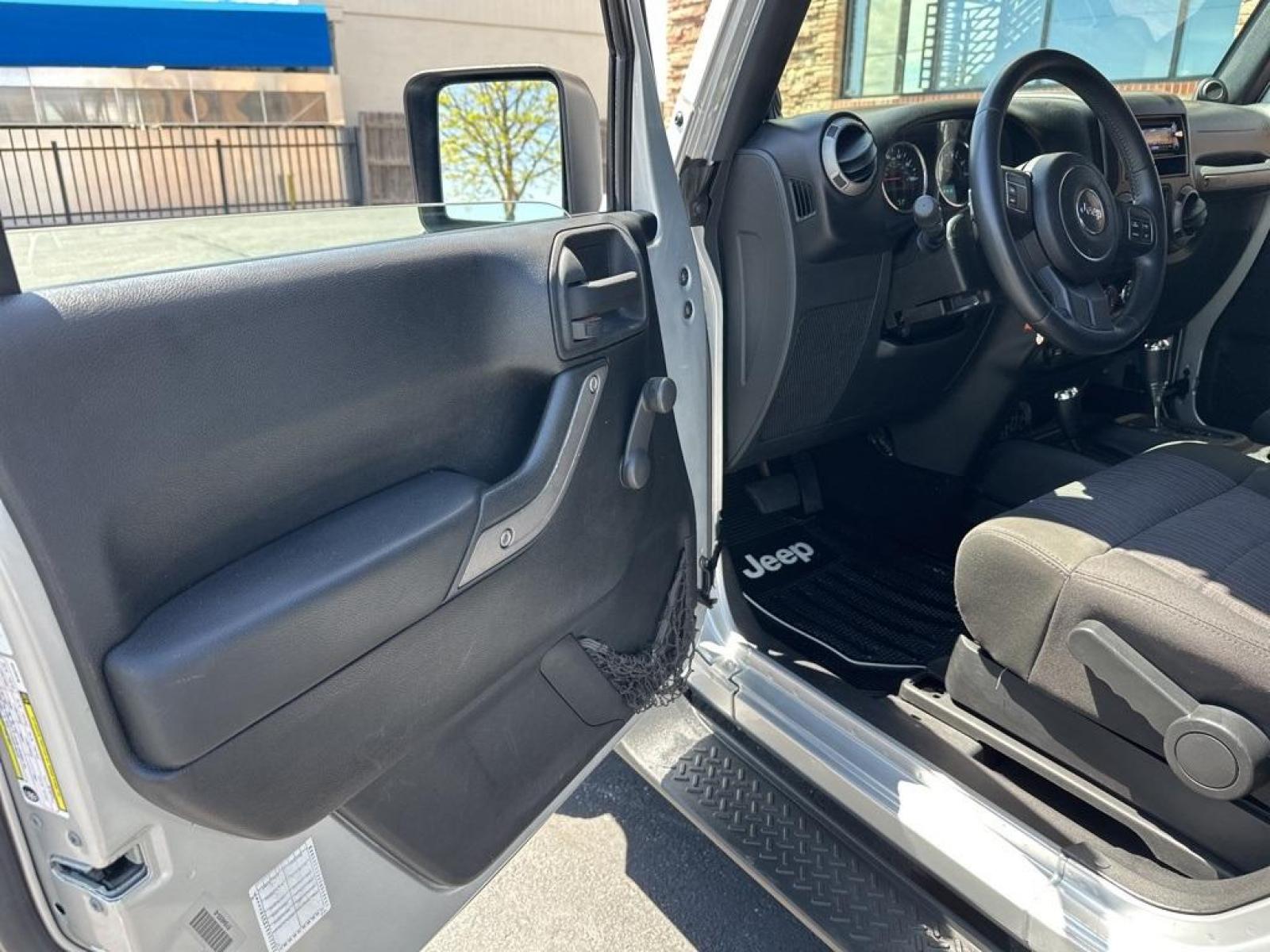 2011 Bright Silver Metallic Clearcoat /Black Interior Jeep Wrangler Sport (1J4GA2D13BL) with an 3.8L V6 SMPI engine, Automatic transmission, located at 8595 Washington St., Thornton, CO, 80229, (303) 287-5511, 39.852348, -104.978447 - 2011 Jeep Wrangler Automatic in Excellent Condition! <br><br>All Cars Have Clean Titles And Are Serviced Before Sale., Clean Carfax, No Accident, Non Smoker, No Pet Odor Or Hair, 4-Speed Automatic, 4WD.<br><br>D1 Auto NEVER charges dealer fees! All cars have clean titles and have been inspected for - Photo #18