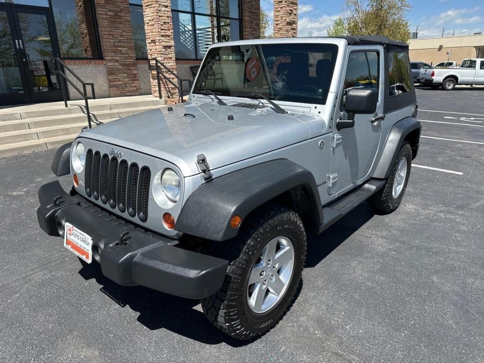 2011 Bright Silver Metallic Clearcoat /Black Interior Jeep Wrangler Sport (1J4GA2D13BL) with an 3.8L V6 SMPI engine, Automatic transmission, located at 8595 Washington St., Thornton, CO, 80229, (303) 287-5511, 39.852348, -104.978447 - 2011 Jeep Wrangler Automatic in Excellent Condition! <br><br>All Cars Have Clean Titles And Are Serviced Before Sale., Clean Carfax, No Accident, Non Smoker, No Pet Odor Or Hair, 4-Speed Automatic, 4WD.<br><br>D1 Auto NEVER charges dealer fees! All cars have clean titles and have been inspected for - Photo #1
