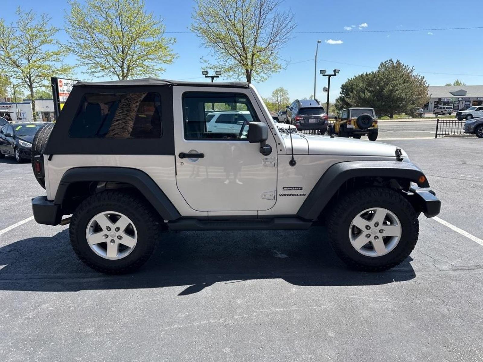 2011 Bright Silver Metallic Clearcoat /Black Interior Jeep Wrangler Sport (1J4GA2D13BL) with an 3.8L V6 SMPI engine, Automatic transmission, located at 8595 Washington St., Thornton, CO, 80229, (303) 287-5511, 39.852348, -104.978447 - 2011 Jeep Wrangler Automatic in Excellent Condition! <br><br>All Cars Have Clean Titles And Are Serviced Before Sale., Clean Carfax, No Accident, Non Smoker, No Pet Odor Or Hair, 4-Speed Automatic, 4WD.<br><br>D1 Auto NEVER charges dealer fees! All cars have clean titles and have been inspected for - Photo #4