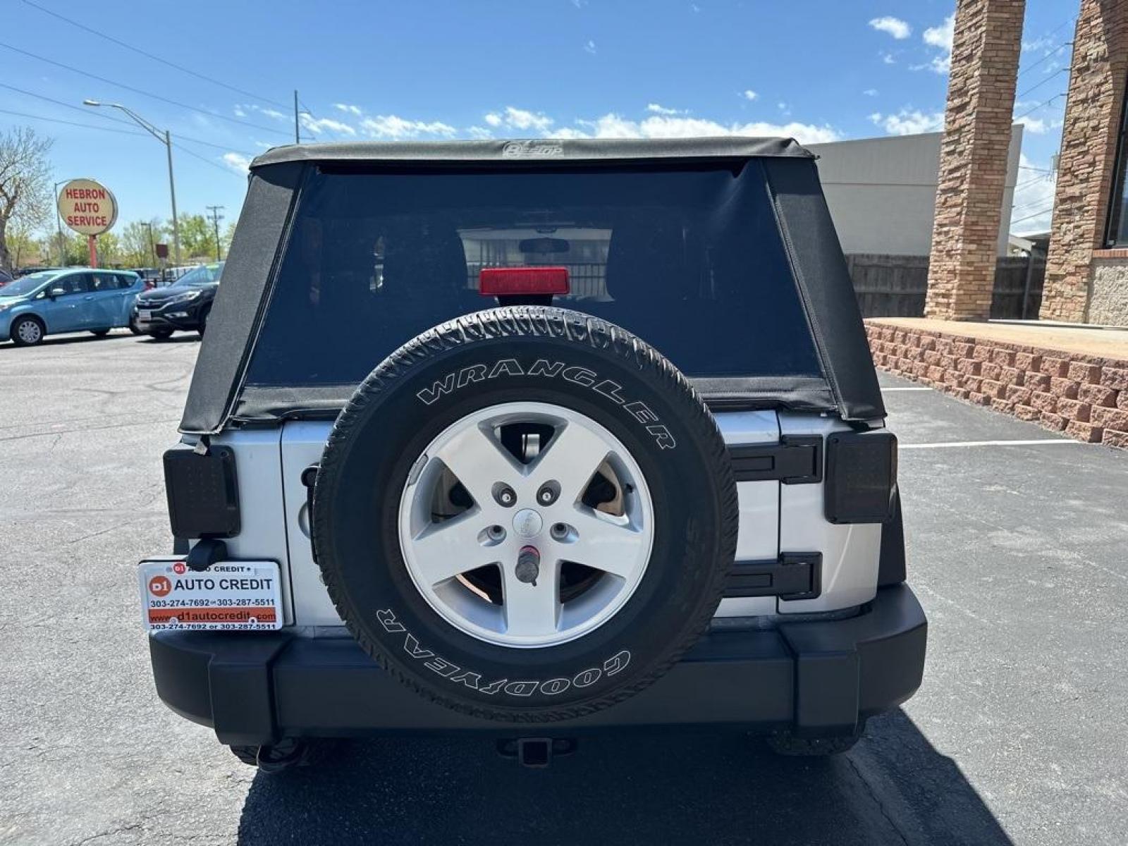 2011 Bright Silver Metallic Clearcoat /Black Interior Jeep Wrangler Sport (1J4GA2D13BL) with an 3.8L V6 SMPI engine, Automatic transmission, located at 8595 Washington St., Thornton, CO, 80229, (303) 287-5511, 39.852348, -104.978447 - 2011 Jeep Wrangler Automatic in Excellent Condition! <br><br>All Cars Have Clean Titles And Are Serviced Before Sale., Clean Carfax, No Accident, Non Smoker, No Pet Odor Or Hair, 4-Speed Automatic, 4WD.<br><br>D1 Auto NEVER charges dealer fees! All cars have clean titles and have been inspected for - Photo #6