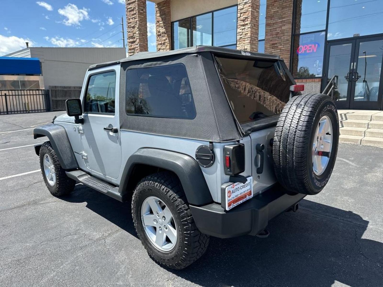 2011 Bright Silver Metallic Clearcoat /Black Interior Jeep Wrangler Sport (1J4GA2D13BL) with an 3.8L V6 SMPI engine, Automatic transmission, located at 8595 Washington St., Thornton, CO, 80229, (303) 287-5511, 39.852348, -104.978447 - 2011 Jeep Wrangler Automatic in Excellent Condition! <br><br>All Cars Have Clean Titles And Are Serviced Before Sale., Clean Carfax, No Accident, Non Smoker, No Pet Odor Or Hair, 4-Speed Automatic, 4WD.<br><br>D1 Auto NEVER charges dealer fees! All cars have clean titles and have been inspected for - Photo #7