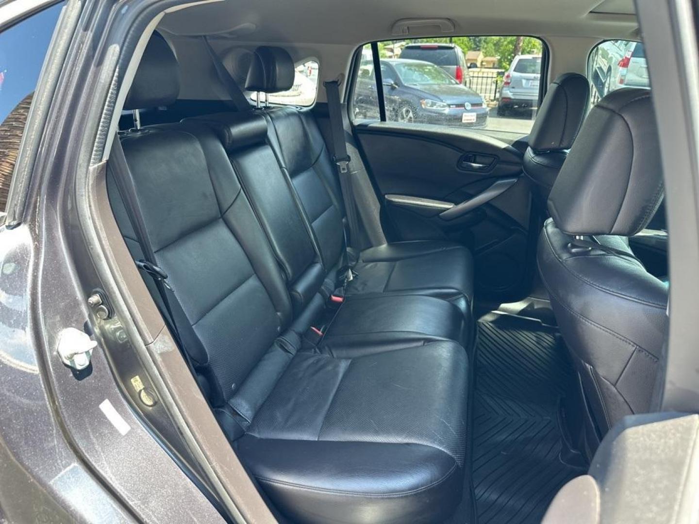 2015 Graphite Luster Metallic /Ebony Acura RDX Technology Package (5J8TB4H57FL) with an 3.5L V6 SOHC i-VTEC 24V engine, Automatic transmission, located at 10890 W. Colfax Ave., Lakewood, CO, 80215, (303) 274-7692, 39.739914, -105.120132 - 2015 Acura RDX<br>All Cars Have Clean Titles And Are Serviced Before Sale., Clean Carfax, No Accident, All Books and Keys, Backup Camera, Leather, Heated Seats, Bluetooth/ With Bluetooth Audio, Non Smoker, No Pet Odor Or Hair, 3.5L V6 SOHC i-VTEC 24V, AWD.<br>D1 Auto NEVER charges dealer fees! All c - Photo#17