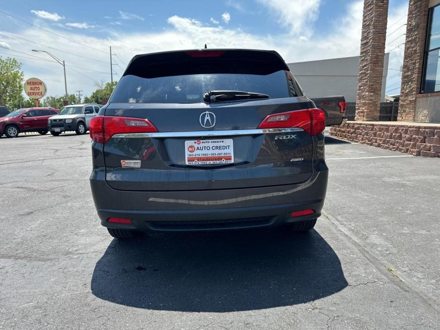 2015 Graphite Luster Metallic /Ebony Acura RDX Technology Package (5J8TB4H57FL) with an 3.5L V6 SOHC i-VTEC 24V engine, Automatic transmission, located at 10890 W. Colfax Ave., Lakewood, CO, 80215, (303) 274-7692, 39.739914, -105.120132 - 2015 Acura RDX<br>All Cars Have Clean Titles And Are Serviced Before Sale., Clean Carfax, No Accident, All Books and Keys, Backup Camera, Leather, Heated Seats, Bluetooth/ With Bluetooth Audio, Non Smoker, No Pet Odor Or Hair, 3.5L V6 SOHC i-VTEC 24V, AWD.<br>D1 Auto NEVER charges dealer fees! All c - Photo#6