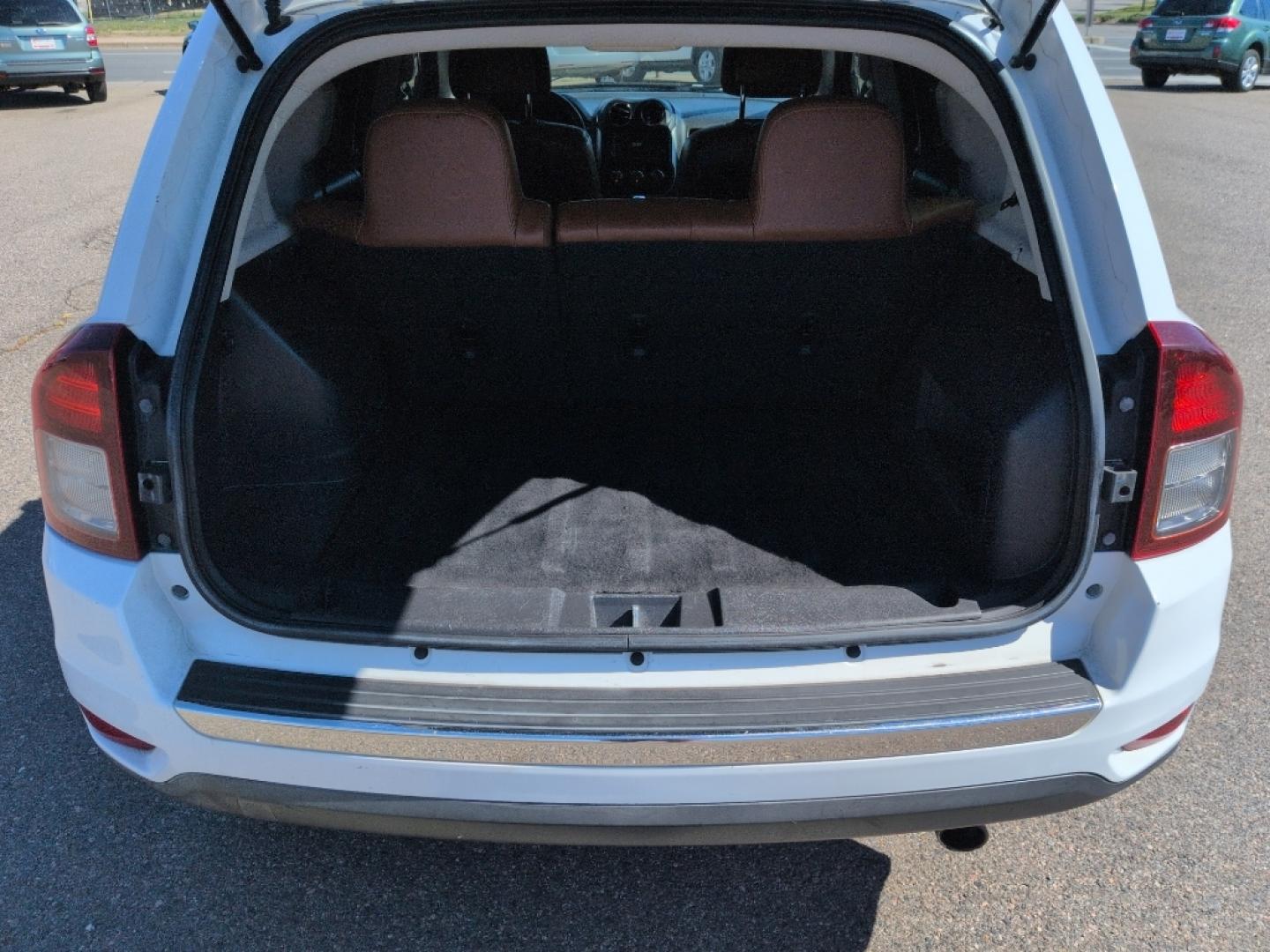 2014 WHITE Jeep Compass Limited (1C4NJCCB5ED) with an 4 Cyl, 2.4L engine, Automatic transmission, located at 10890 W. Colfax Ave., Lakewood, CO, 80215, (303) 274-7692, 39.739914, -105.120132- Photo#20