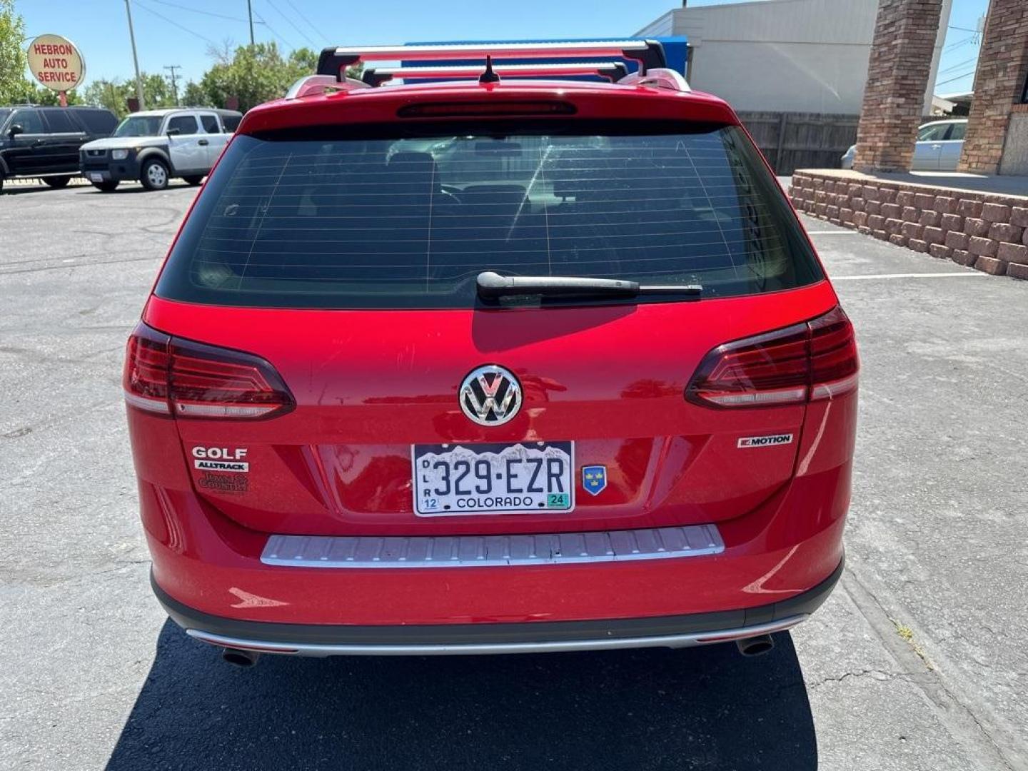 2019 Tornado Red /Black Volkswagen Golf Alltrack TSI S (3VWH17AU9KM) with an 1.8L TSI engine, Automatic transmission, located at 10890 W. Colfax Ave., Lakewood, CO, 80215, (303) 274-7692, 39.739914, -105.120132 - 2019 Volkswagen Golf Alltrack All Wheel Drive and One Owner.<br><br>All Cars Have Clean Titles And Are Serviced Before Sale., Apple/Android Car Play, New Tires, Backup Camera, Leather, Heated Seats, Non Smoker, AWD.<br><br>D1 Auto NEVER charges dealer fees! All cars have clean titles and have been i - Photo#6