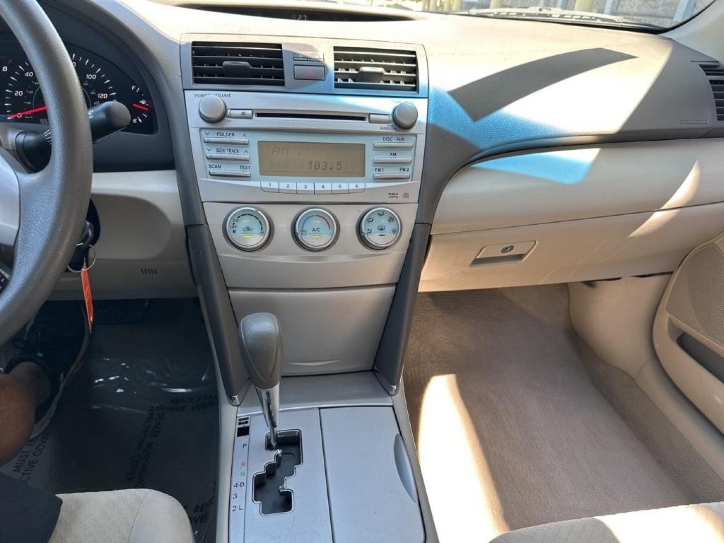 2009 Aloe Green Metallic /Bisque Toyota Camry Base CE (4T1BE46K09U) with an 2.4L I4 SMPI DOHC PZEV engine, Automatic transmission, located at 10890 W. Colfax Ave., Lakewood, CO, 80215, (303) 274-7692, 39.739914, -105.120132 - 2009 Toyota Camry CARFAX One-Owner. FWD <br>All Cars Have Clean Titles And Are Serviced Before Sale., CarfaxOne Owner, No Accidents, Non Smoker, 2.4L I4 SMPI DOHC PZEV, FWD.<br><br>D1 Auto NEVER charges dealer fees! All cars have clean titles and have been inspected for mechanical issues. We have fi - Photo#10