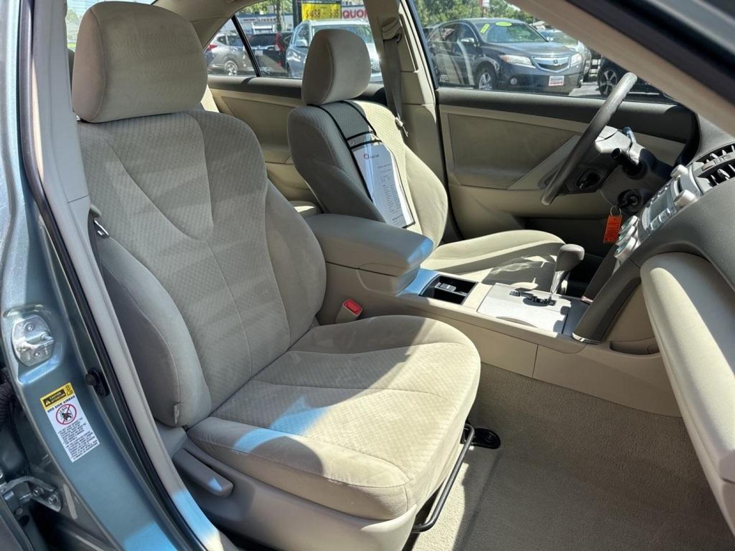2009 Aloe Green Metallic /Bisque Toyota Camry Base CE (4T1BE46K09U) with an 2.4L I4 SMPI DOHC PZEV engine, Automatic transmission, located at 10890 W. Colfax Ave., Lakewood, CO, 80215, (303) 274-7692, 39.739914, -105.120132 - 2009 Toyota Camry CARFAX One-Owner. FWD <br>All Cars Have Clean Titles And Are Serviced Before Sale., CarfaxOne Owner, No Accidents, Non Smoker, 2.4L I4 SMPI DOHC PZEV, FWD.<br><br>D1 Auto NEVER charges dealer fees! All cars have clean titles and have been inspected for mechanical issues. We have fi - Photo#12