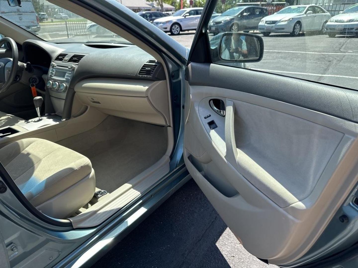 2009 Aloe Green Metallic /Bisque Toyota Camry Base CE (4T1BE46K09U) with an 2.4L I4 SMPI DOHC PZEV engine, Automatic transmission, located at 10890 W. Colfax Ave., Lakewood, CO, 80215, (303) 274-7692, 39.739914, -105.120132 - 2009 Toyota Camry CARFAX One-Owner. FWD <br>All Cars Have Clean Titles And Are Serviced Before Sale., CarfaxOne Owner, No Accidents, Non Smoker, 2.4L I4 SMPI DOHC PZEV, FWD.<br><br>D1 Auto NEVER charges dealer fees! All cars have clean titles and have been inspected for mechanical issues. We have fi - Photo#17