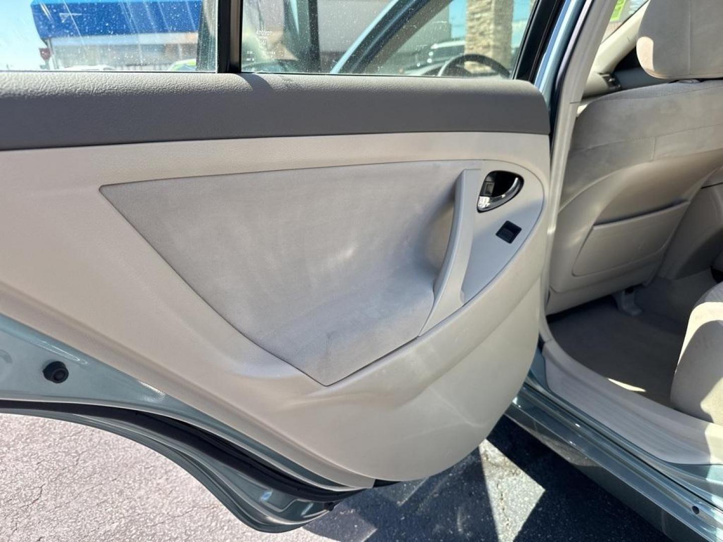 2009 Aloe Green Metallic /Bisque Toyota Camry Base CE (4T1BE46K09U) with an 2.4L I4 SMPI DOHC PZEV engine, Automatic transmission, located at 10890 W. Colfax Ave., Lakewood, CO, 80215, (303) 274-7692, 39.739914, -105.120132 - 2009 Toyota Camry CARFAX One-Owner. FWD <br>All Cars Have Clean Titles And Are Serviced Before Sale., CarfaxOne Owner, No Accidents, Non Smoker, 2.4L I4 SMPI DOHC PZEV, FWD.<br><br>D1 Auto NEVER charges dealer fees! All cars have clean titles and have been inspected for mechanical issues. We have fi - Photo#18